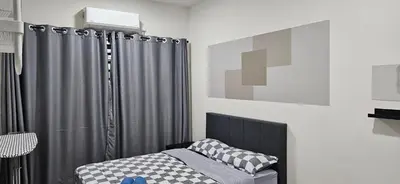 a bedroom with a bed and a gray shower curtain at TELUK INTAN LANDED LUXURY HOMESTAY 3BEDROOM in Teluk Intan