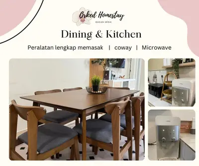 a dining room table and chairs with the words dining and kitchen at Orked Homestay Bagan Serai in Bagan Serai