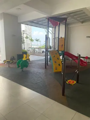 a play room with a playground with a slide at Georgetown ins cozy 2 bedroom in George Town