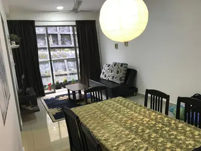 a dining room with a table and chairs and a room with a window at Palas Horizon in Kabus in Brinchang