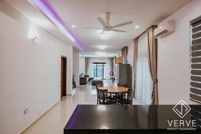 a living room with a ceiling fan and a table at Ipoh Garden Luxury House By Verve (14pax) in Ipoh