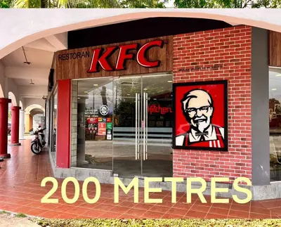 a kfc store with a sign on the front of it at Sunway Alpine Suites near Onsen and Themepark Tambun Ipoh by IWH in Ipoh