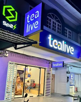 a teeline store with signs on the side of it at Sunway Alpine Suites near Onsen and Themepark Tambun Ipoh by IWH in Ipoh