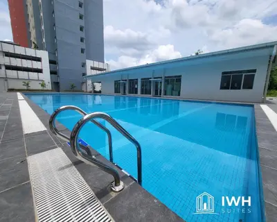 a swimming pool on the roof of a building at Ipoh Anderson Town Suites with 2 Parking by IWH in Ipoh