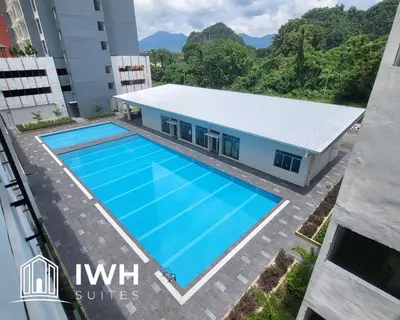 an overhead view of a swimming pool in a building at Ipoh Anderson Town Suites with 2 Parking by IWH in Ipoh