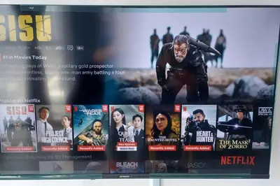 a display of movies on a display screen at Aesthetic Urban Suite With Infinite Pool & Gym in Jelutong