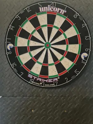 a dartboard with the word unicorn on it at UniVilla- Ideal Family Home for 18pax in Gelugor