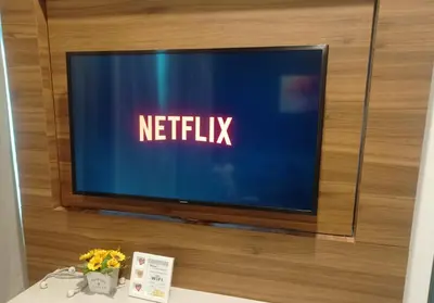 a television with the netflix sign on a wall at Lost World of Tambun, Sunway Onsen Studio, 1BR, 2-4pax in Tambun