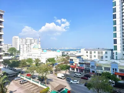 an aerial view of a city with buildings and cars at OV06-3room Georgetown Seaview Pg in George Town
