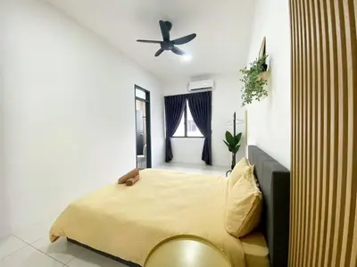 a bedroom with a bed and a ceiling fan at BrandNew Modern Cozy House@ALMA NEAR JUSCO in Bukit Mertajam