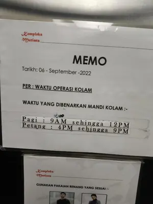 a sign that says meno on a wall at ZH Studio Apartment Gua Musang With WIFI dan POOL in Gua Musang