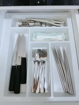 a white tray with silver utensils in a drawer at BM\u5927\u5c71\u811a Bandar Perda Metropol Service Apartment 3-minute To KPJ Hospital in Bukit Mertajam