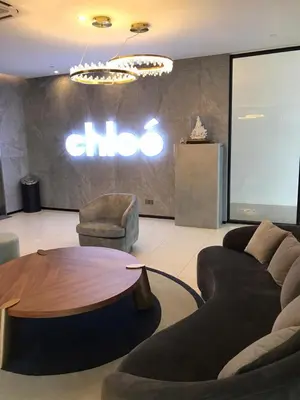 a living room with a couch and a table at Luxury Seaview Private Elevator Near Island Hospital and Gurney plaza \u68b9\u57ce\u65e0\u654c\u6d77\u666f\u79c1\u4eba\u7535\u68af\u9760\u8fd1\u533b\u9662\u548c\u5546\u573a in Tanjong Tokong