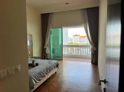 a bedroom with a bed and a large window at 2Beds Seaview Waterfront Straits Quay w/Free Carpark And Bathub in Tanjong Tokong