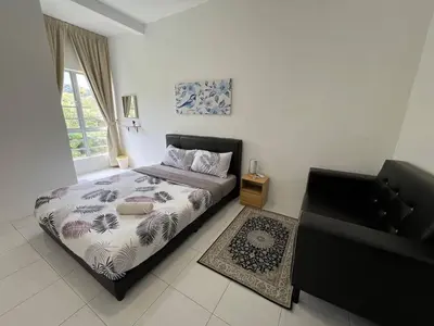 a bedroom with a bed and a window at Aufa Homestay 2 at Emerald Avenue Brinchang in Brinchang