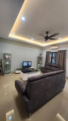 a living room with a couch and a ceiling fan at AY Homestay Midtown Falim in Ipoh