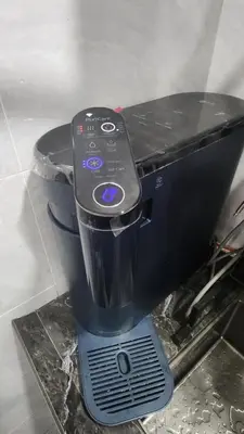 a black blender sitting on top of a counter at AY Homestay Midtown Falim in Ipoh