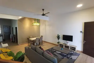 a living room with a couch and a table at Cosy 2-Storey Holiday Home Vines 2 @Pasar Malam -2 in Tanah Rata