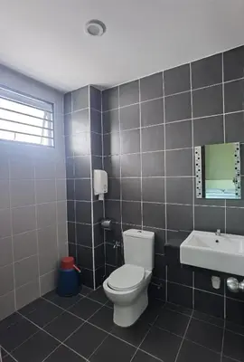 a bathroom with a toilet and a sink at Cosy 2-Storey Holiday Home Vines 2 @Pasar Malam -2 in Tanah Rata