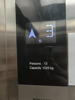 a sticker on the door of an elevator with the words at river hotel in Simpang
