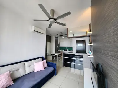 a living room with a couch and a ceiling fan at THE MAJESTIC IPOH A20 by ZamanJa in Ipoh