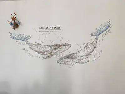 a drawing of two whales on a white background at Padang Serai Roomstay Family Suite Share Bathroom804 in Padang Serai