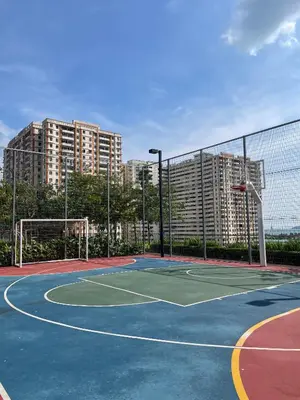 a tennis court in front of some tall buildings at 2 Carpark 3R2B 10 Pax City View Condominium 23A in Jelutong