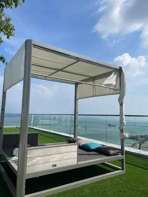 a canopy bed on the roof of a house at 2 Carpark 3R2B 10 Pax City View Condominium 23A in Jelutong