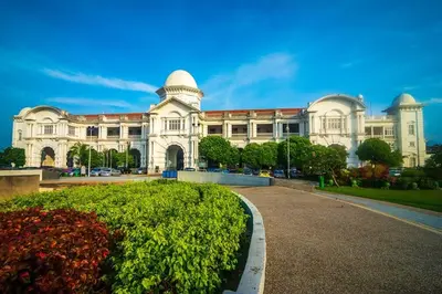 a large white building with a street in front of it at Maleeq Hotel Meru Ipoh in Ipoh