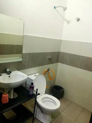 a bathroom with a toilet and a sink at Swedish Style Homestay in Teluk Intan