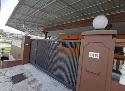 a building with a gate with the number on it at IPOH Be-Shine TAMAN WANG 13-14pax Homestay with 6Bedrooms, 6Bathroom, 1Living, 1Dining, 1Kitchen with 3Parkings in Ipoh