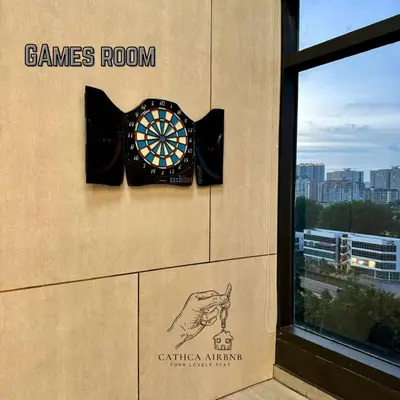 a dart board on the side of a building at Urban Suites Studio #SelfCheck-In #PrivateSpace in Jelutong