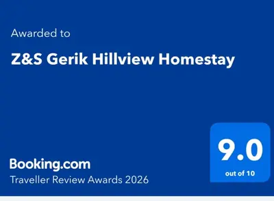 a screenshot of a cell phone with at Z&S Gerik Hillview Homestay in Gerik