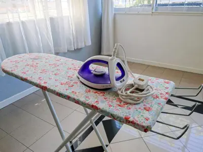 a table with a sewing machine on top of it at HT Homestay BigSemi-D BBQwedding in town in Jelutong