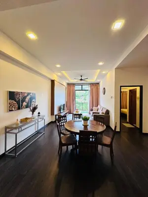 a large living room with a table and chairs at Adamhawa Homestay 2 Nova Cameron Highlands in Brinchang
