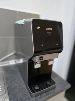 a coffee maker sitting on top of a counter at The Octagon Ipoh City Centre Leisure Suite in Ipoh