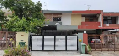 a house with a gate in front of it at 12 George town 6room terrace gurney heritage adventist hospital restaurant shopping mall in George Town