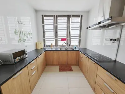 a kitchen with wooden cabinets and a sink at 162 Home4Stay Deluxe Big 3story 6Rooms 20pax Wedding USM Arena Bridge in Gelugor