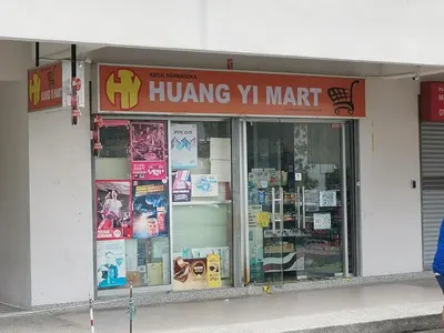 a hong yo mart store with a sign on the front at 162 Home4Stay Deluxe Big 3story 6Rooms 20pax Wedding USM Arena Bridge in Gelugor