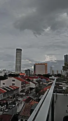 a view of a city with buildings and a bridge at Georgetown AY Hotel in George Town