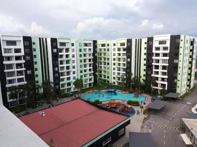 an aerial view of a playground in front of buildings at 3R Guest House Manhattan Condominium in Ipoh