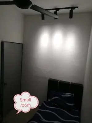 a small room with a small room sign on the wall at Simpang Ampat QQ in Simpang Ampat