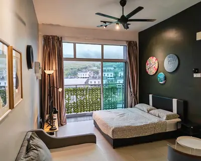 a bedroom with a bed and a large window at 1BR Cool Homestay at Cameron Golden Hills Night Market in Brinchang