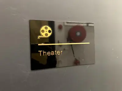 a metal box with a sign that says theater at Georgetown Classic Collection 3BR-10PAX in George Town