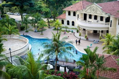an aerial view of a pool at a resort at Sea View Penthouse Comfy Home at Batu Ferringhi in Batu Ferringhi