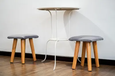 two chairs and a table with a table at Snooze Hotel in Brinchang
