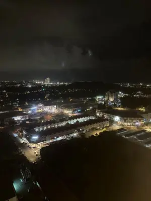 a view of a city at night with lights at Newly Furnished Metropol Service Apartment with Attractive View in Bukit Mertajam