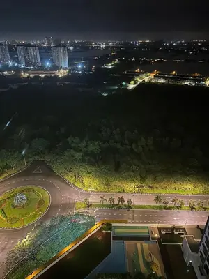 an aerial view of a city at night at Newly Furnished Metropol Service Apartment with Attractive View in Bukit Mertajam