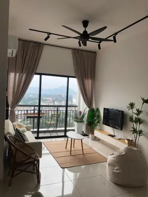 a living room with a ceiling fan and large windows at Yuru House - The Horizon Ipoh in Ipoh