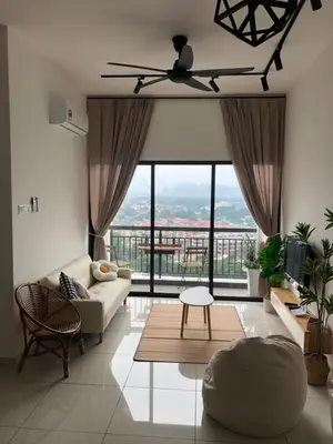 a living room with a couch and a large window at Yuru House - The Horizon Ipoh in Ipoh
